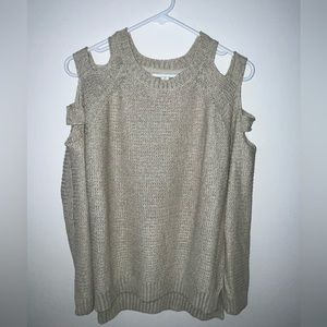Tan sweater with small slits in the shoulders